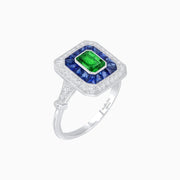 Art Deco Inspired Emerald Cut Halo Ring with Calibré Gems - Shahin Jewelry